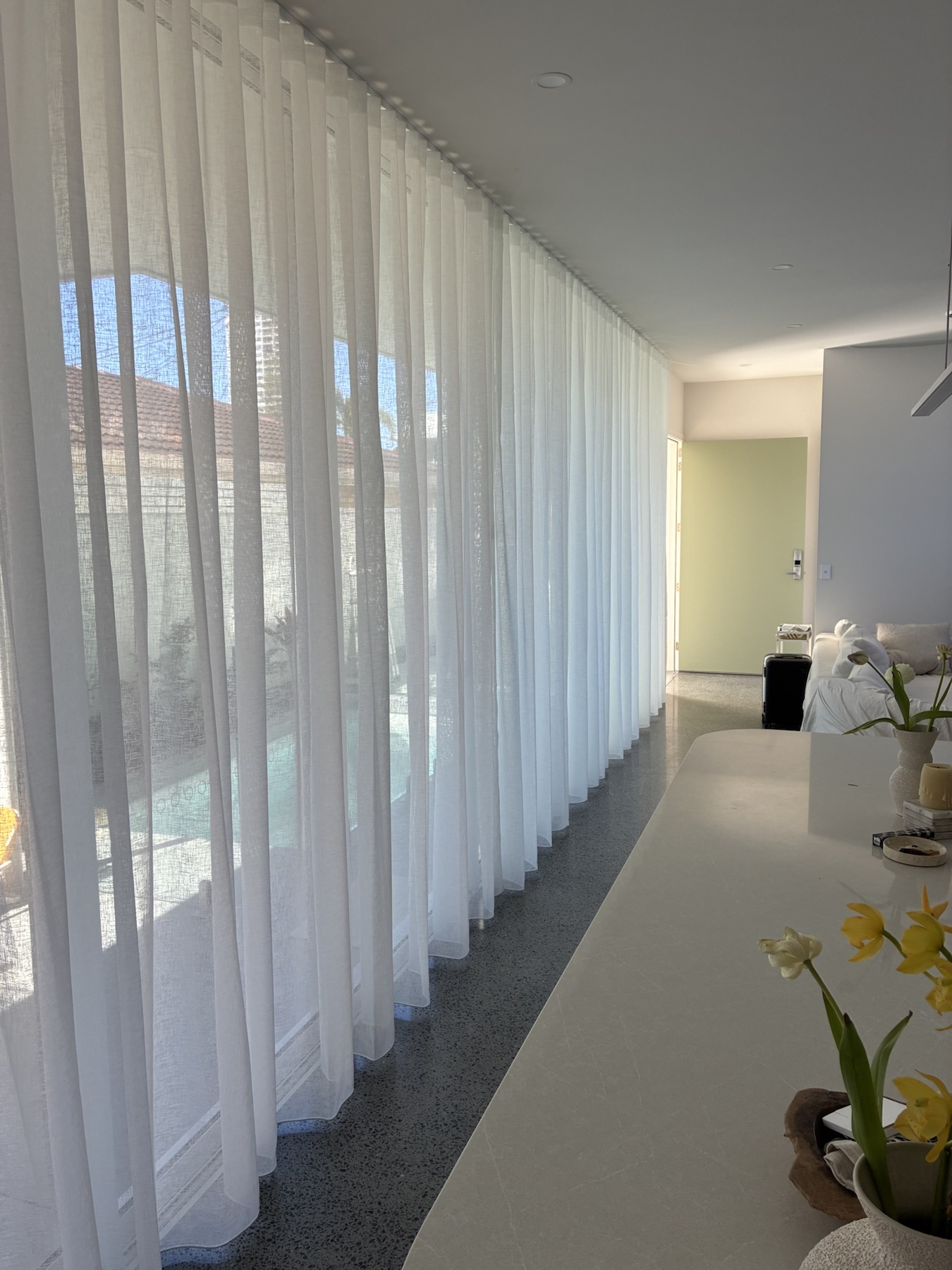 Premium window furnishings installed in a coastal home